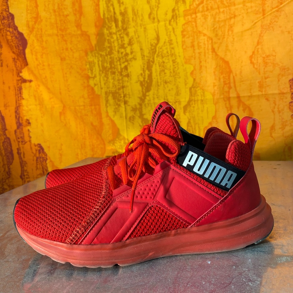 Red Puma sports shoes.